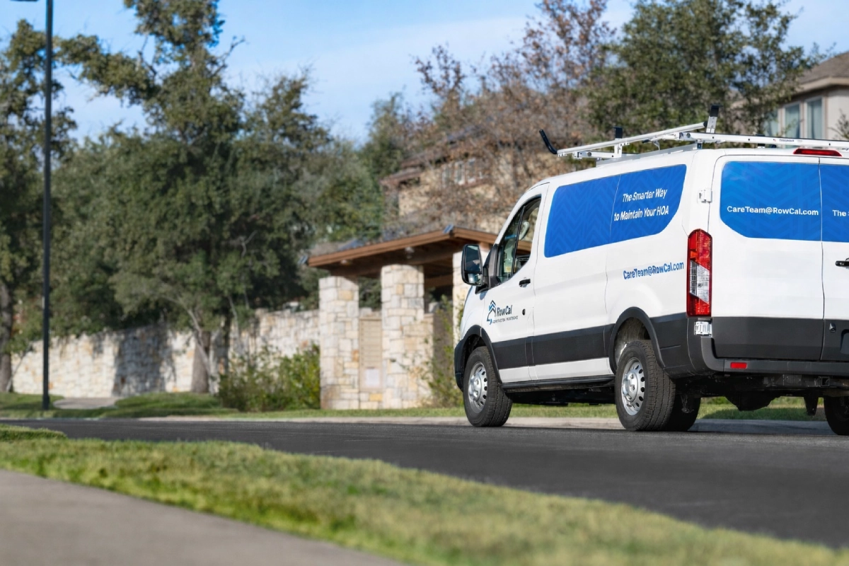 RowCal service van outside in a Tennessee residential neighborhood.